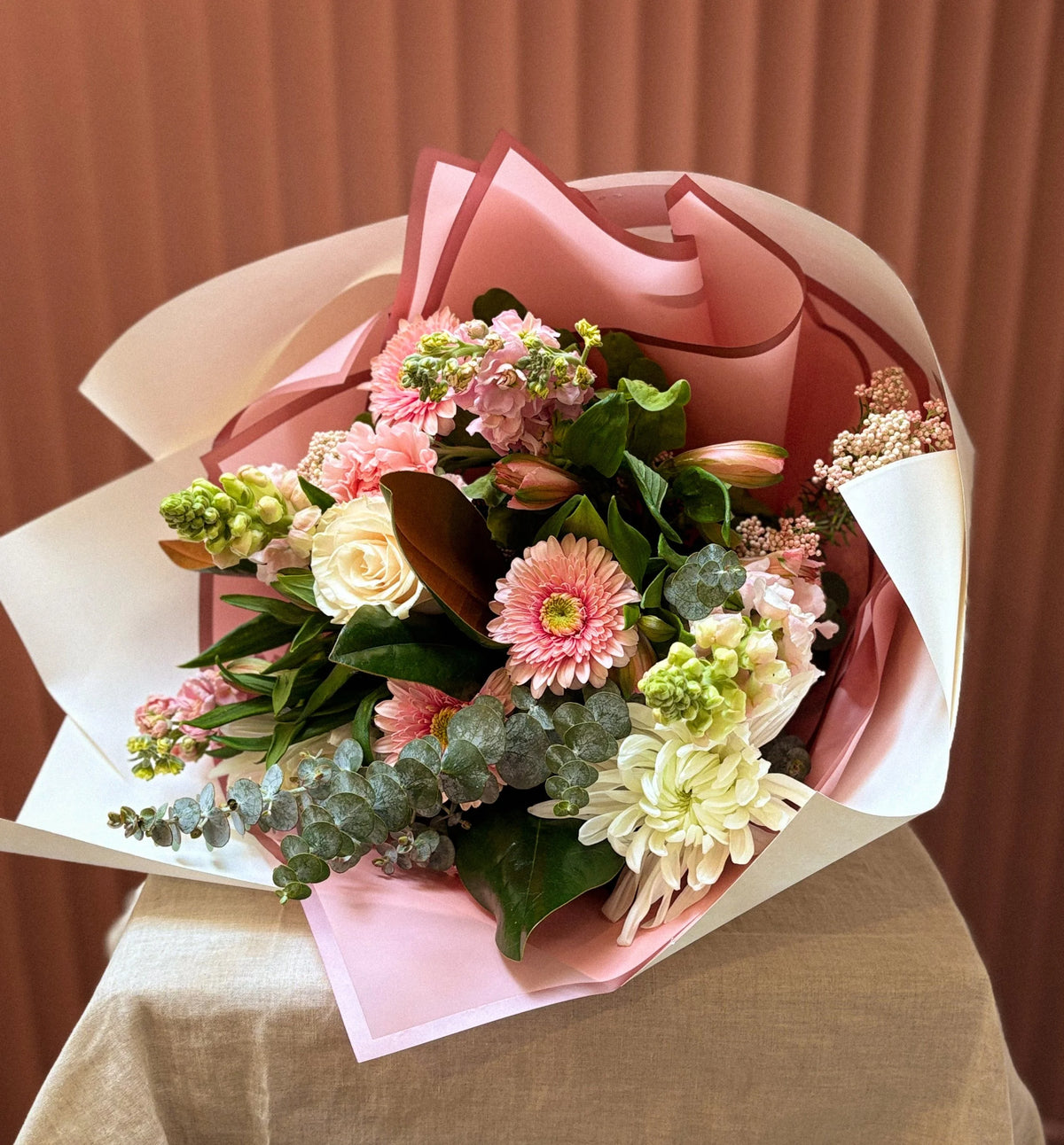 Pink gerbera, rose and hydrangea bouquet in pink wrap, Pom Pom Florals