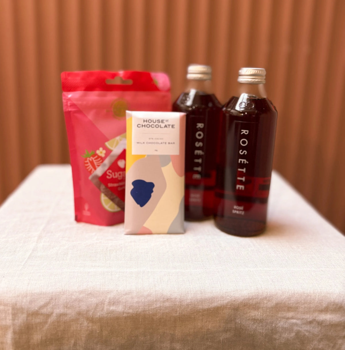 Summer Spritz gift bag contents with spritz bottles and treats