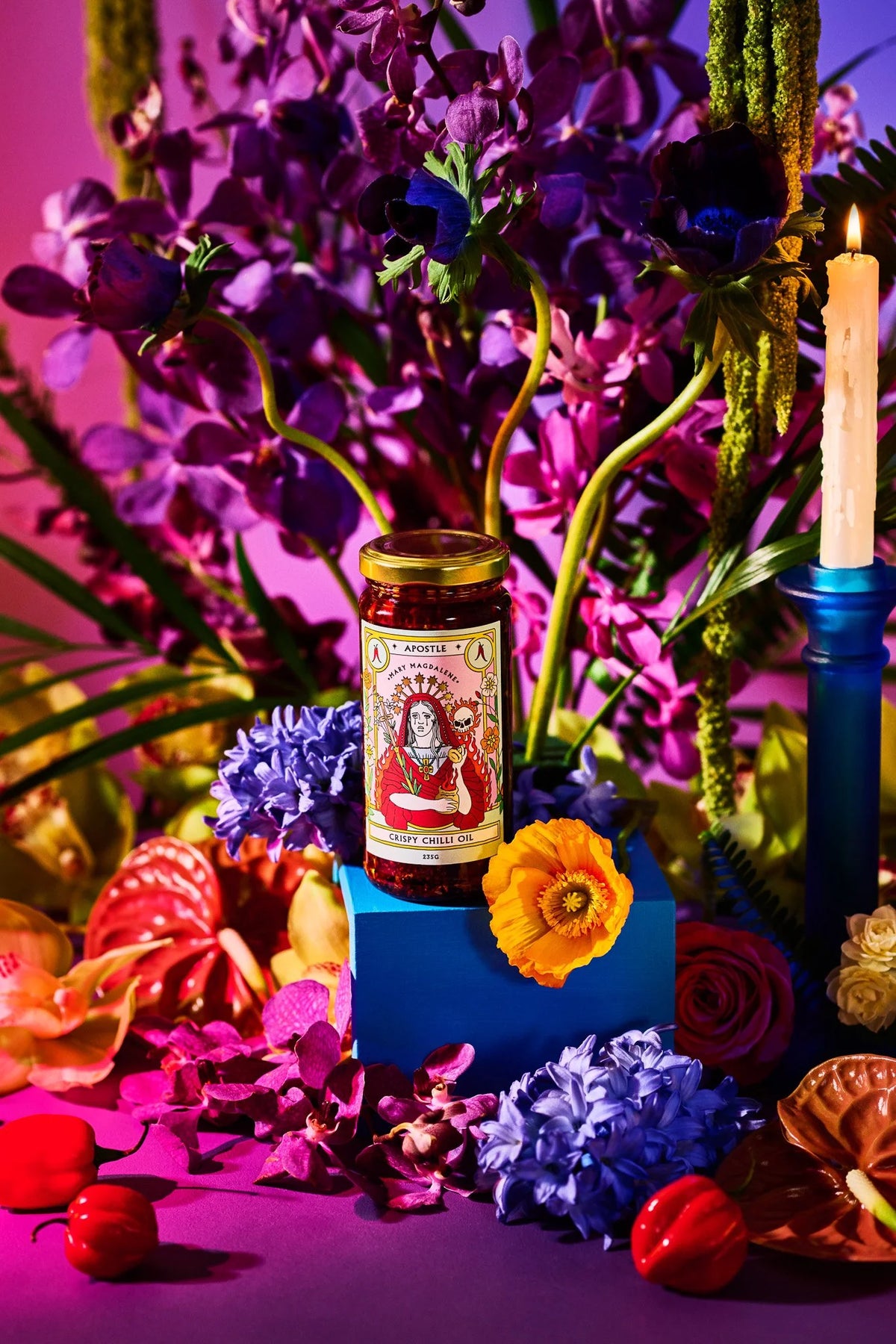 Apostle Mary Magdalene chilli oil styled with purple flowers