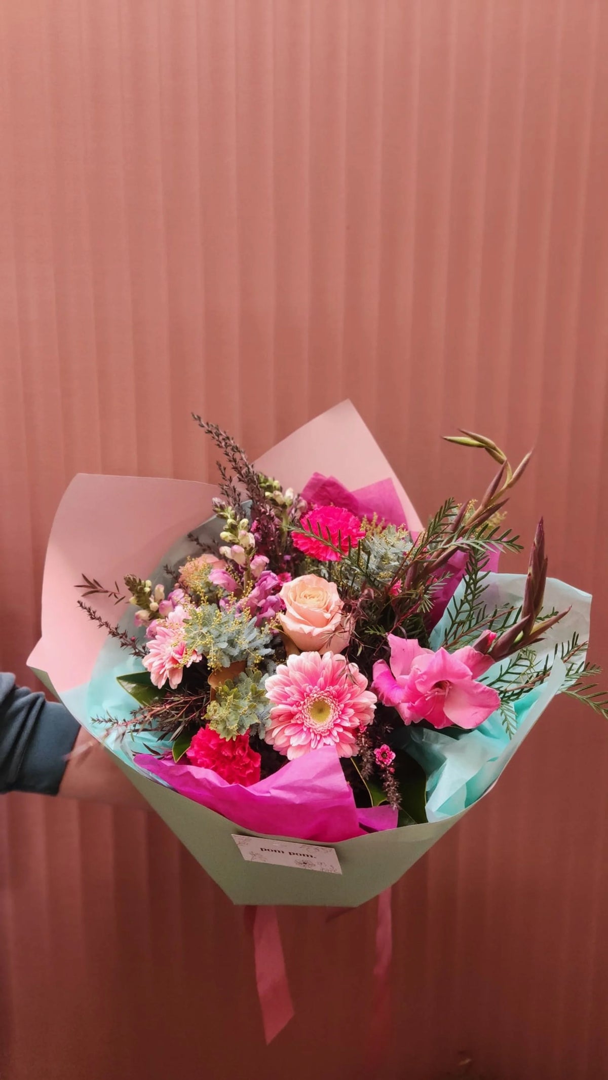 Seasonal bouquet of pink roses and blooms, Hastings flower delivery