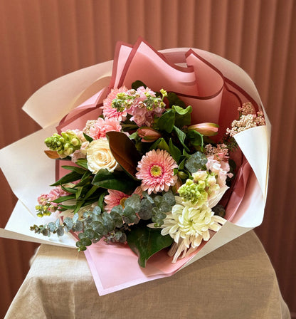 Pink gerbera, rose and hydrangea bouquet in pink wrap, Pom Pom Florals