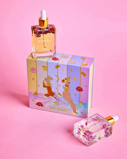 Floral Fling gift set perfume oil and illustrated box on pink