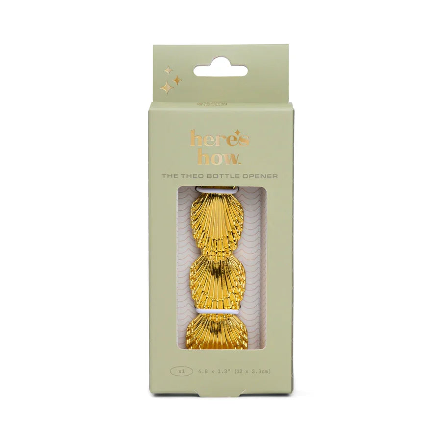 The Theo gold shell bottle opener in its gift box