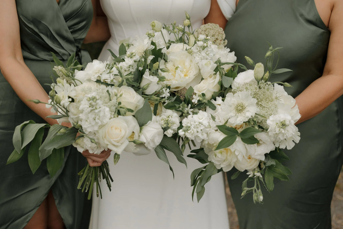 Margie and Ray's wedding with white florals by Pompom Florals