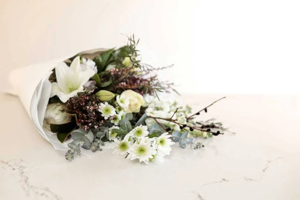 Classic white and green bouquet with chrysanthemums and freesias